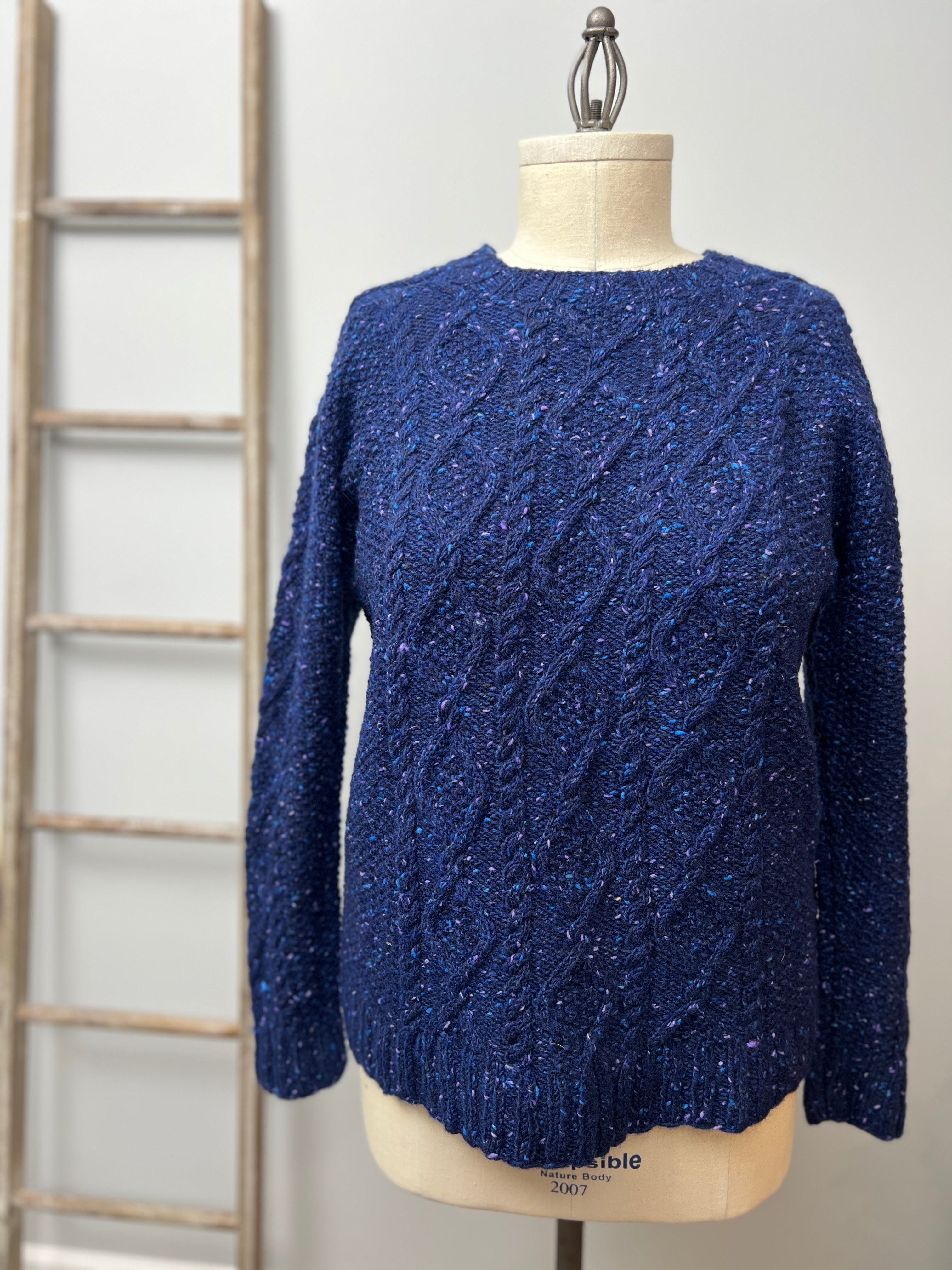 Overland Trail cabled knit sweater in blue tweed wool, saddle shoulder construction