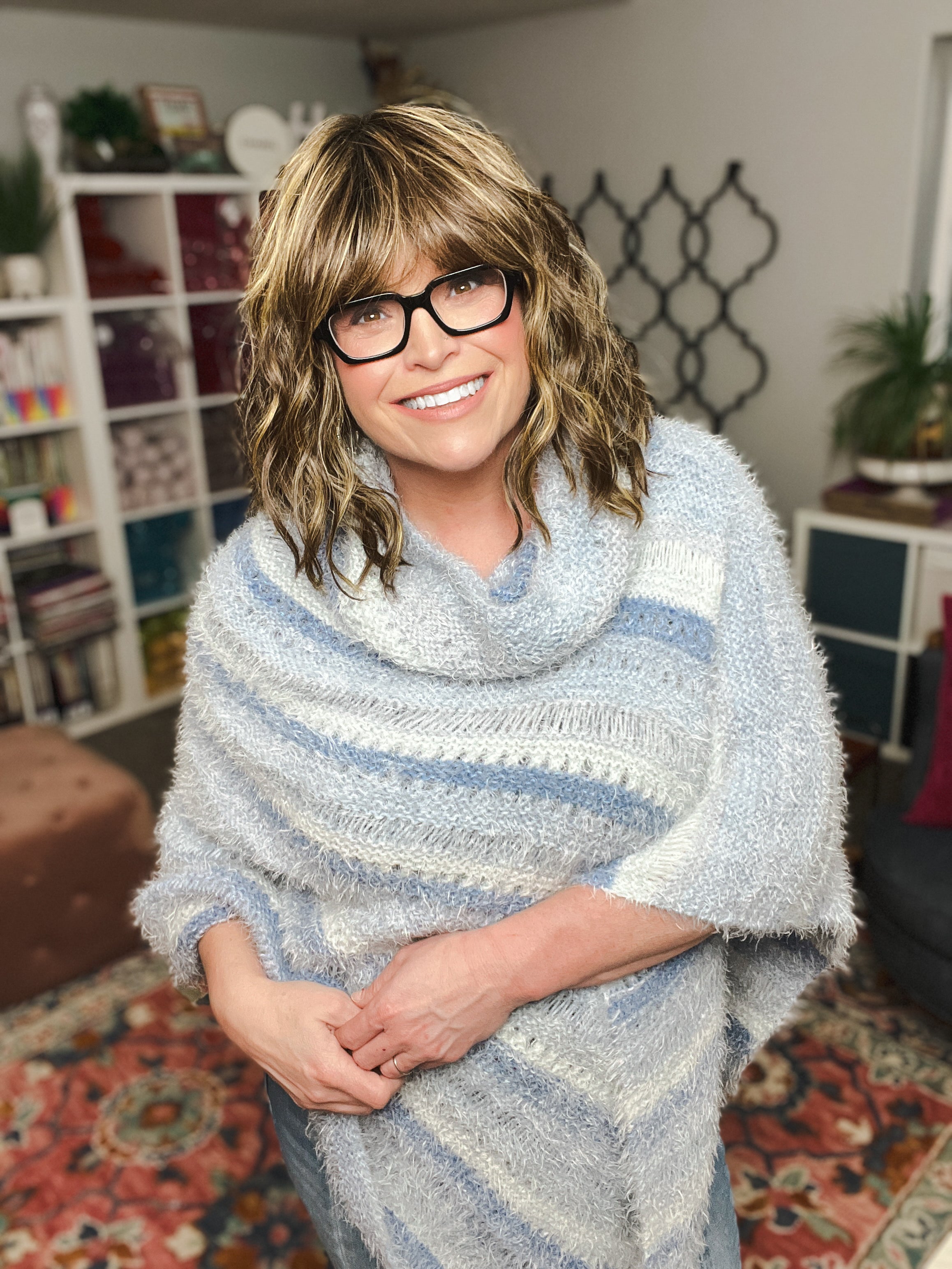 Cozy knit poncho with cowl neck in soft striped yarn