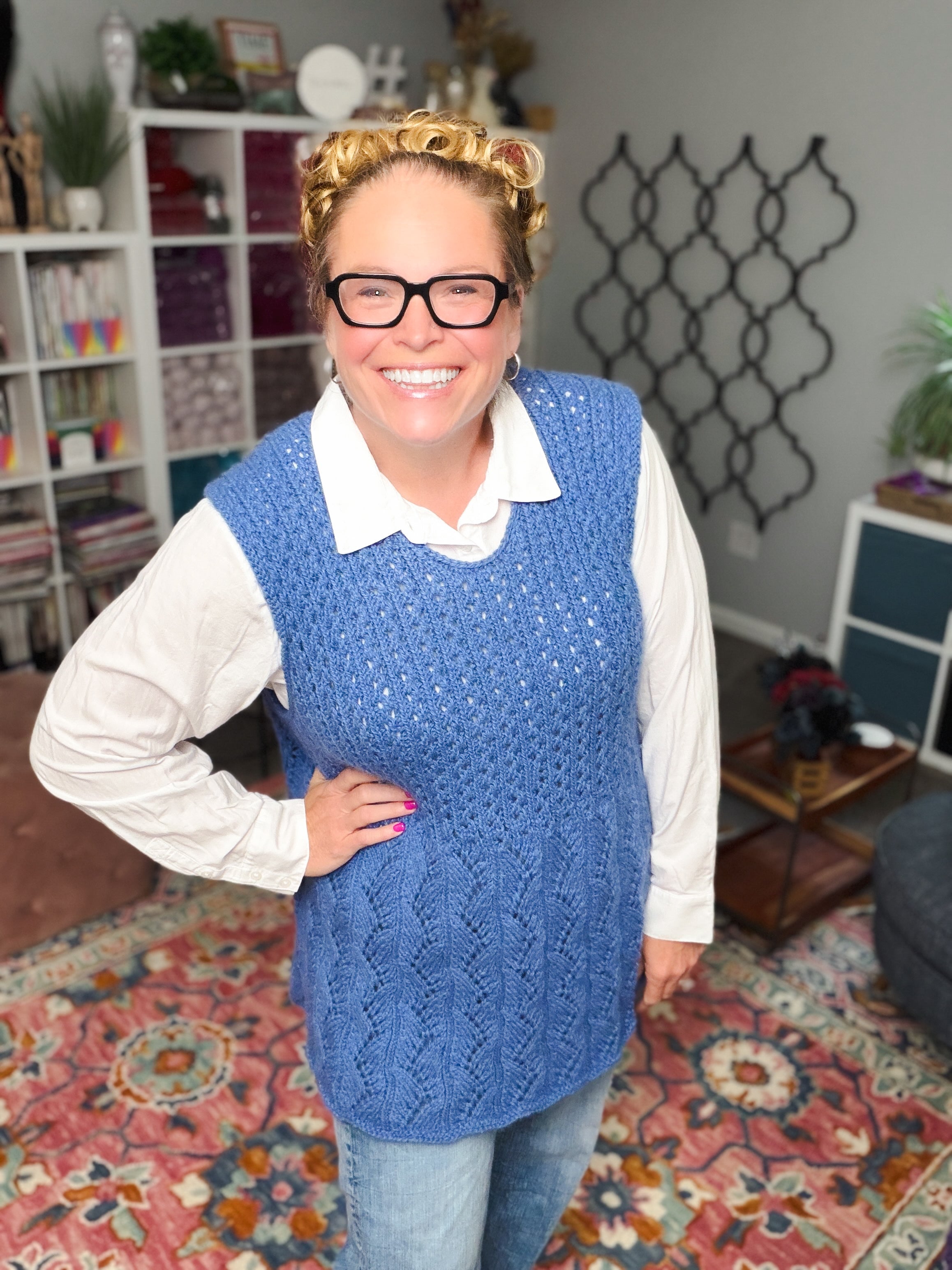 Lace knit tunic sleeveless sweater worn over shirt