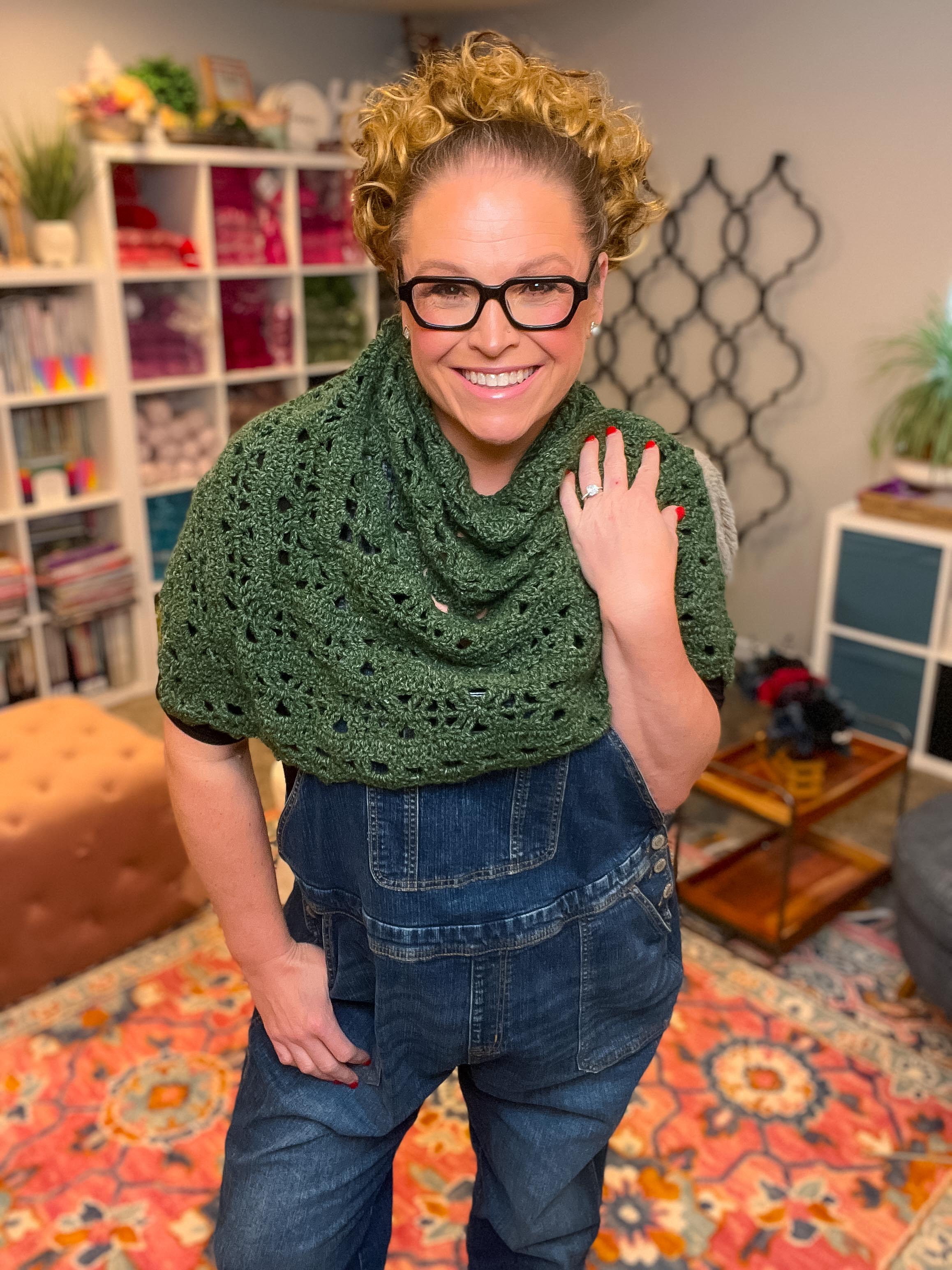 Easy crochet shawl pattern made with one skein showing lightweight lace triangle design